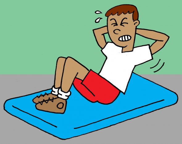 Boy doing sit-up on mat and sweating