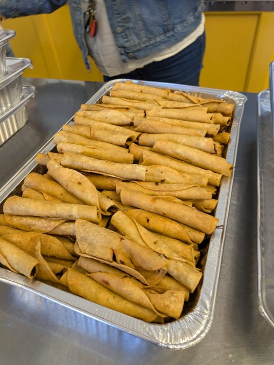 dish of 100 Taquitos prepared by Los Yaquis