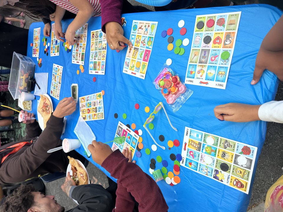 Students playing loteria at a table