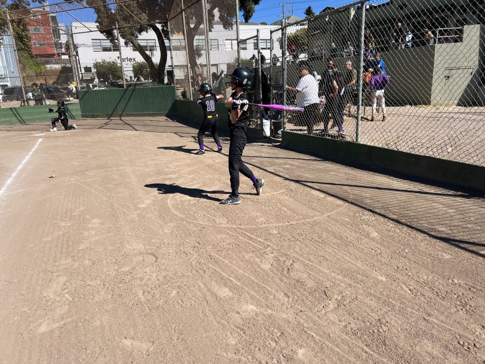 student on deck in softball