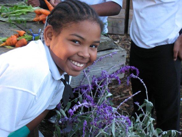 Elementary school student in garden