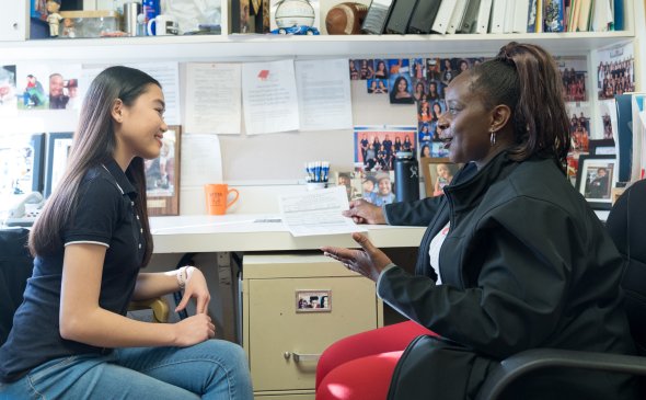 Student receiving counseling from staff person