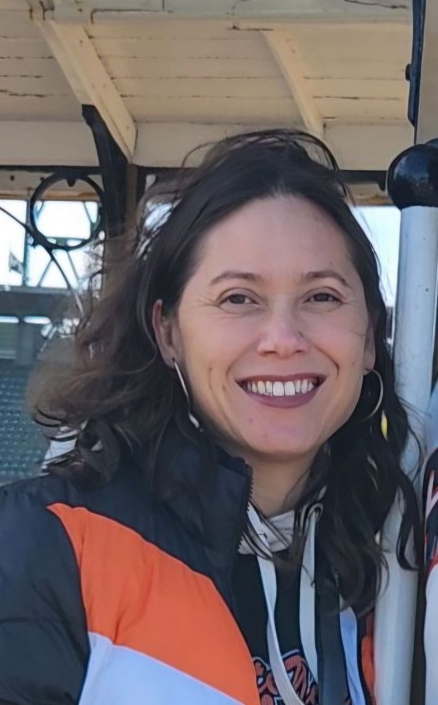 Smiling woman with long brown hair