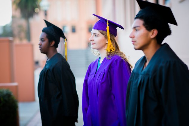 students in graduation gowns